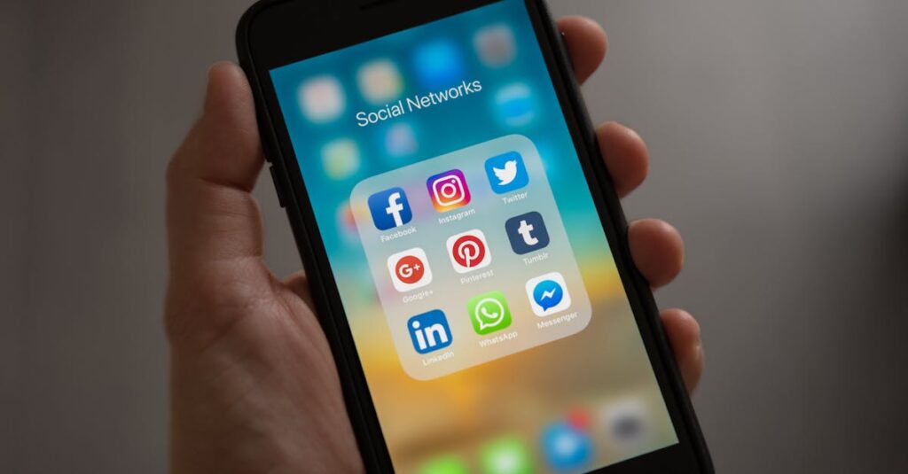 pexels-photo-607812-607812 A smartphone displaying various social media icons held in a hand, showcasing modern communication apps.